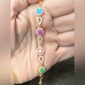 Pretty Bird Gold Bracelet with Blue, Pink, Orange, and Green Gems